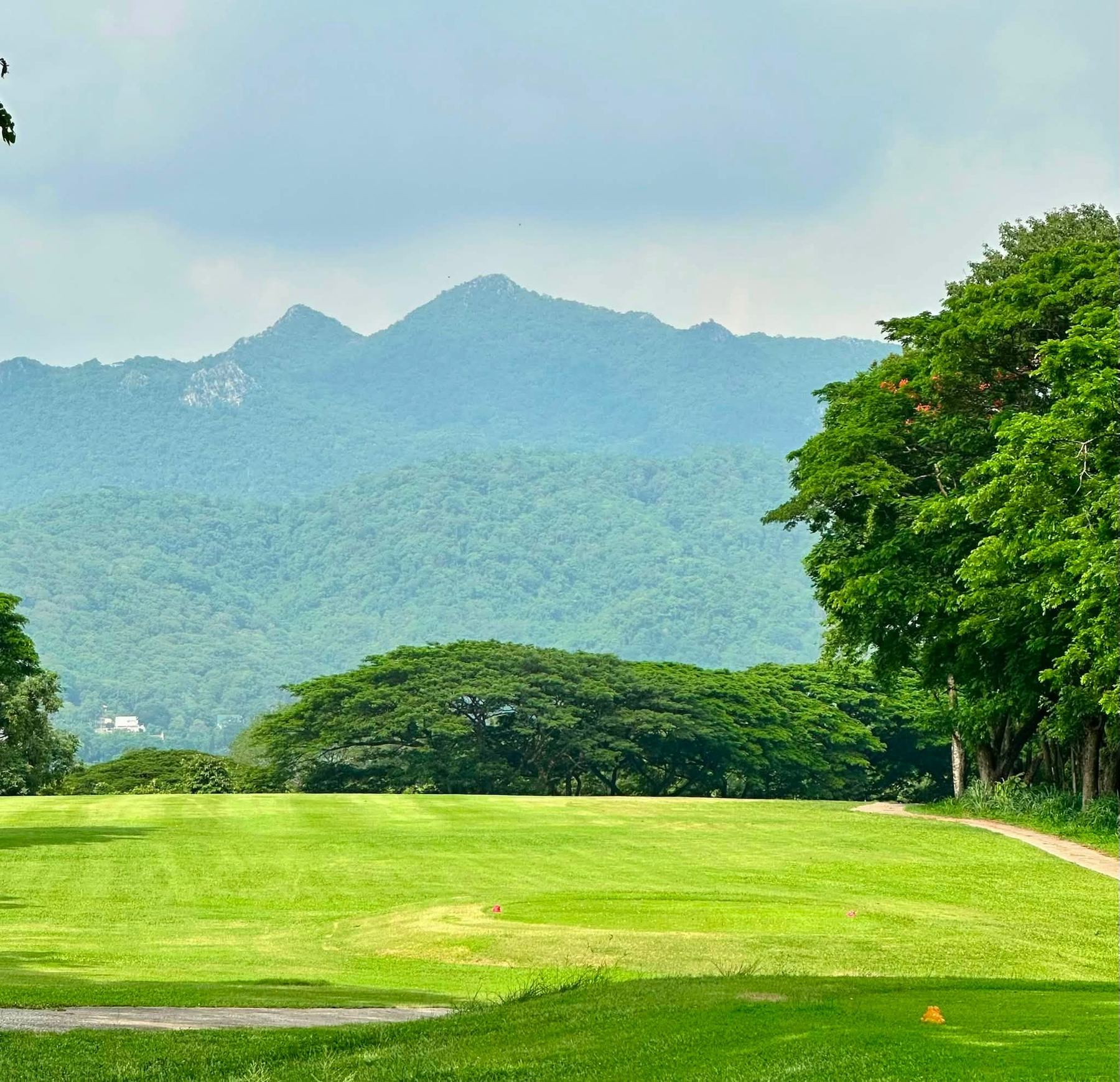 Fairway framed by mountains